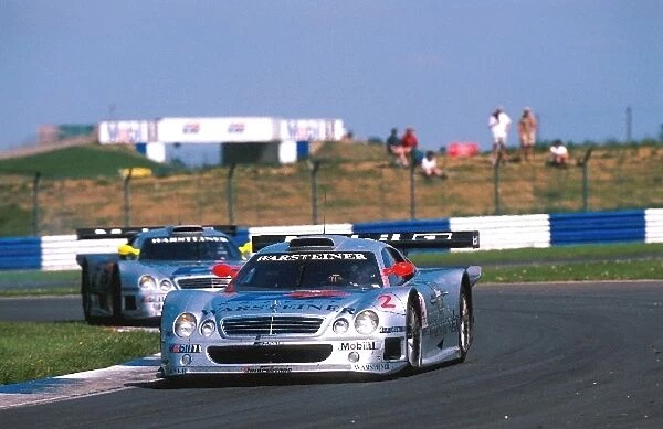 FIA Grand Touring Championship: Fourth place finishers Klaus Ludwig and Ricardo Zonta Mercedes-Benz CLK-GTR are pursued by their team mates