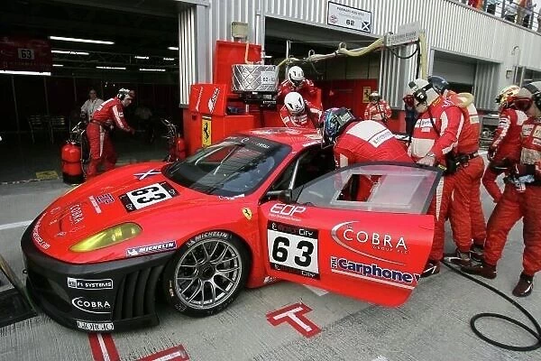 FIA GT. The GT2 class winning Scuderia Ecosse Ferrari 430 GT2 of Tim Mullen 