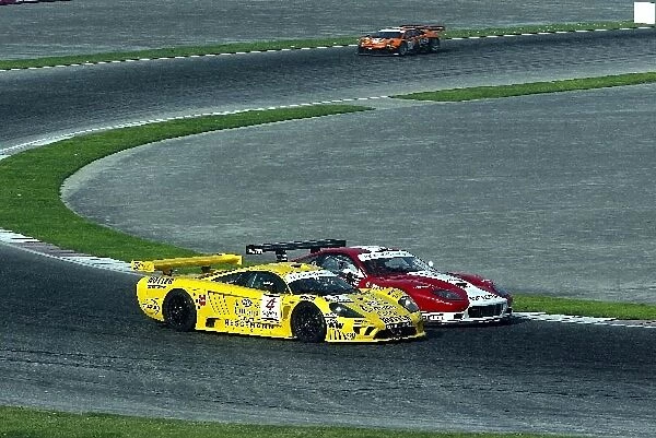 FIA GT Championship: Emanuele Naspetti GPC Giesse Squadra Corse Ferrari 575 GTC battles with Walter Lechner Jr Konrad Motorsport Saleen S7-R