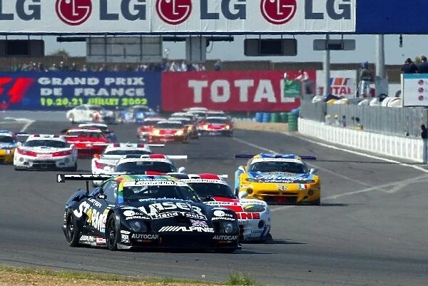 FIA GT Championship: The Lister Storm of Jamie Campbell Walter  /  Nicolaus Springer leads into the first turn at the start