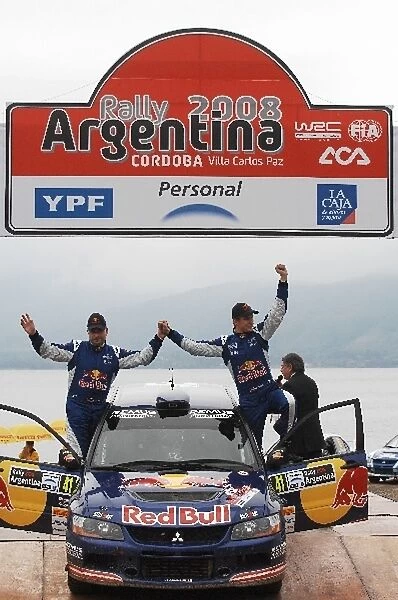 FIA World Rally Championship: Andreas Aigner, Mitsubishi Lancer, on the podium