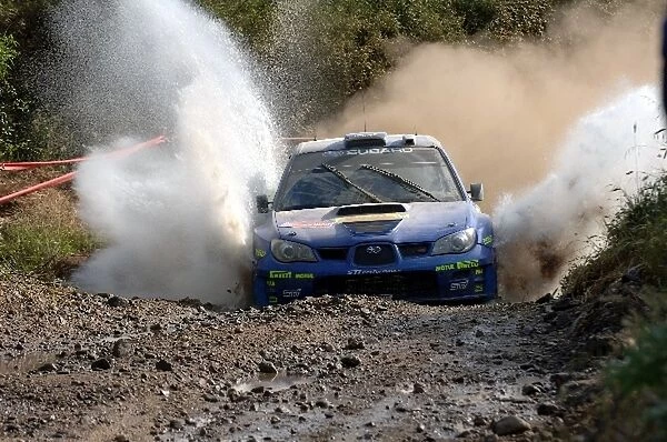 FIA World Rally Championship: Chris Atkinson, Subaru Impreza WRC, in the watersplash on Stage 6