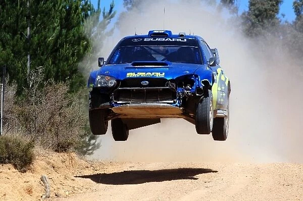 FIA World Rally Championship: Chris Atkinson with co-driver Glenn Macneall Subaru Impreza WRC on Stage 12 showing signs of an excursion into
