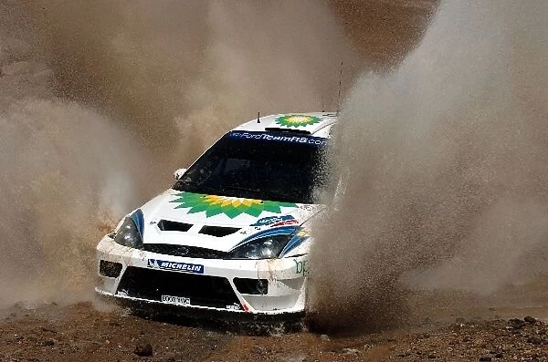FIA World Rally Championship: Francois Duval  /  Stephane Prevot Ford Focus WRC 03 who finished 2nd goes through a watersplash
