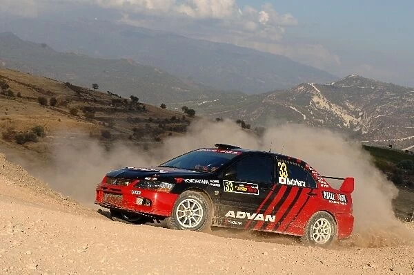 FIA World Rally Championship: Fumio Nutahara in action on Stage 15