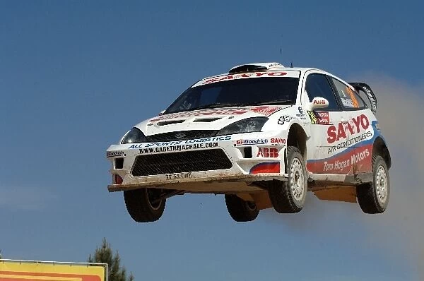 FIA World Rally Championship: Gareth MacHale, Ford Focus RS WRC, flies high at the jump on Stage 11