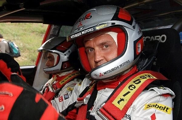 FIA World Rally Championship: Gigi Galli, Mitsubishi Lancer WRC, at the start of stage 7. He finished leg 1 in second place
