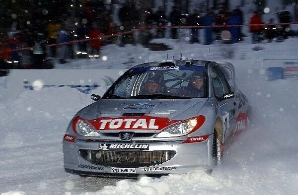 FIA World Rally Championship: Harri Rovanpera Peugeot 206 WRC on stage 1. He finished the day in 2nd place overall