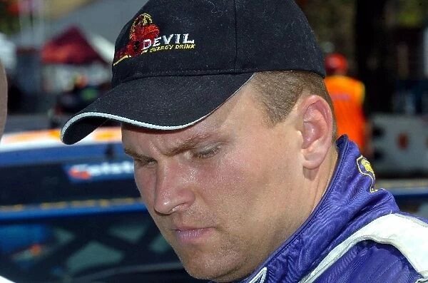 FIA World Rally Championship: Jani Psonen Mitsubishi Lancer EVO VII realises that his Production Cup title hopes are compromised after he lost