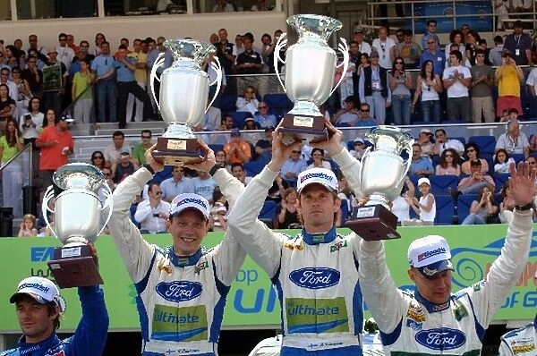 FIA World Rally Championship: L-R: Timo Rautiainen and Marcus Gronholm, Ford, celebrate their victory