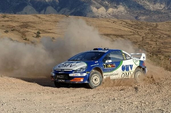 FIA World Rally Championship: Manfred Stohl in action on Stage 15