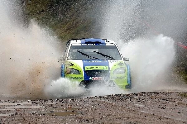 FIA World Rally Championship: Marcus Gronholm, Ford Focus WRC, in the water splash