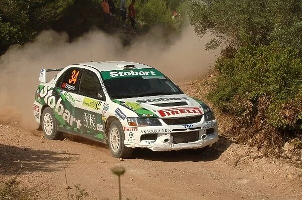 FIA World Rally Championship: Mark Higgins, Mitsubishi Lancer, in action on Stage 19