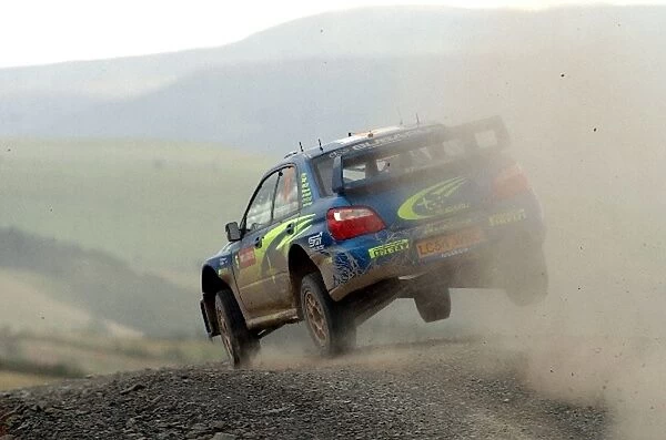FIA World Rally Championship: Petter Solberg, Subaru Impreza WRC, jumps on Stage 9
