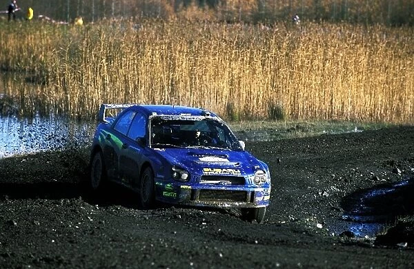 Fia World Rally Championship: Petter Solberg and Phil Mills, Subaru Impreza WRC, enter Walters Arena