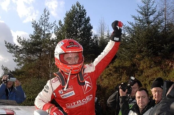 FIA World Rally Championship: Third placed Sebastien Loeb Citroen C4 at the end of the final stage, celebrating the drivers championship