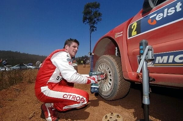 FIA World Rally Championship: Rally winner Francois Duval Citroen Xsara WRC changes the wheels around before the final stage