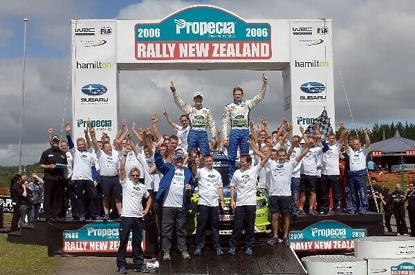 FIA World Rally Championship: Rally winner Marcus Gronholm and the Ford team celebrate winning the Manufacturers trophy