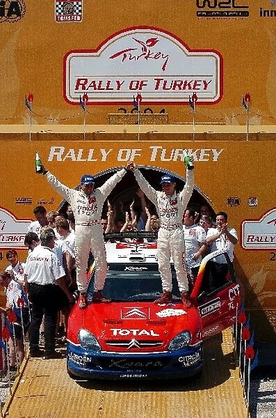 FIA World Rally Championship: Rally winners Sebastien Loeb with co-driver Daniel Elena Citroen Xsara WRC celebrate on the podium