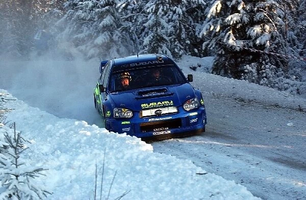 FIA World Rally Championship: Tommi Makinen Subaru Impreza WRC with co-driver Kaj Lindstrom