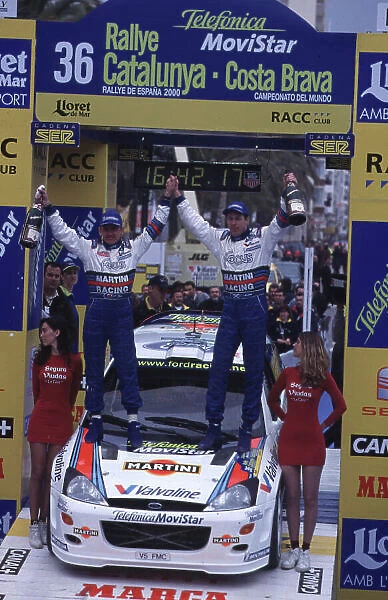 FIA World Rally Champs Catalunya Rally, Spain. 30 / 3-2 / 4 / 2000 Colin McRae and co-driver Nicky Grist celebrate victory on the podium. Portrait. photo: World McKlein tel: (+44) 0208 251 3000 e-mail: digital@latphoto.co.uk 35mm Original Image