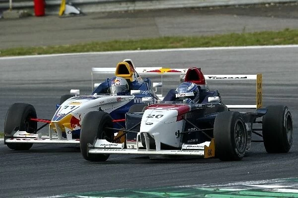 Filip Salaquarda (CZE), Sonax I. S. R-Charouz, holding off Sebastian Vettel (GER)