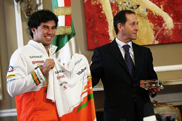 Force India F1 Driver Announcement Belgrave Square, London 12th December 2013 Sergio Perez in his new team clothing. World Copyright: Sam Bloxham / LAT Photographic ref: Digital Image IMG_6525