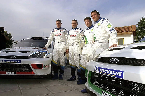 The Ford drivers show the world media their new sponsors, BP Castrol, at the press launch before the Acropolis Rally 2003. Photo /  McKlein / LAT