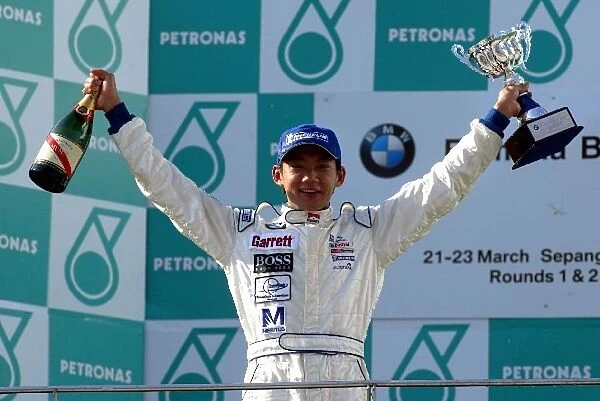 Formula BMW Asia: Race winner Ho-Pin Tung celebrates on the podium