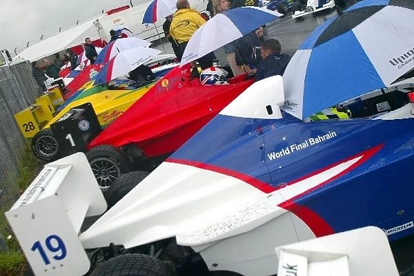 Formula BMW UK Championship: Cars in the assembly area before the wet qualifying session