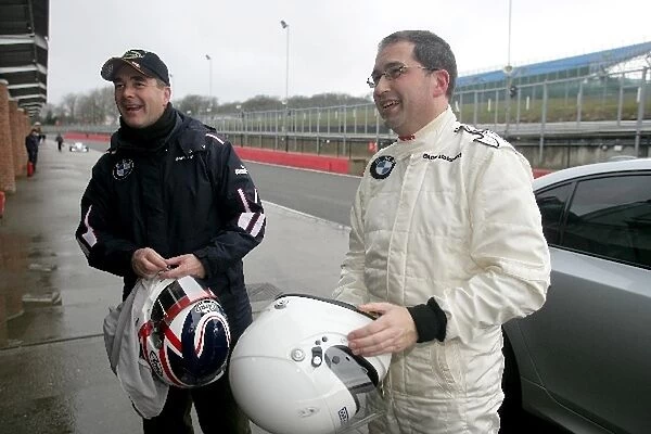Formula BMW UK Testing: L-R: Nigel Mansell talks with Wolfgang Obermaier BMW UK Financial Director