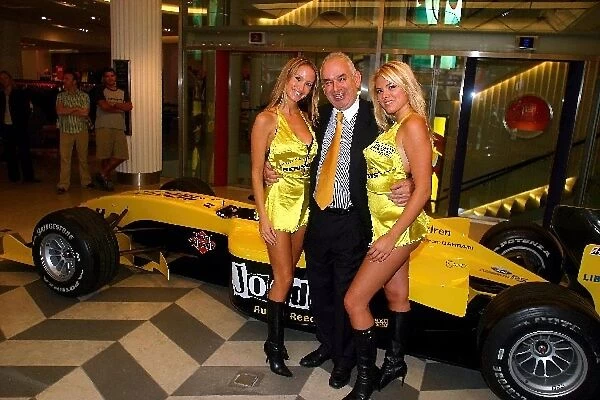 Formula One comes to Regent Street: Jordan pitgirls, Michelle Clack and Leah Newman with LG Electronics manager
