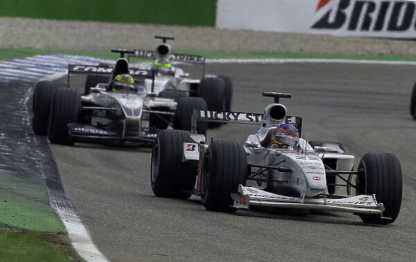 Formula One German Grand Prix Jacques Villeneuve leads Ralf Schumacher and Ricardo Zonta Hockenheim, 30-07-2000 Pic Steve Etherington