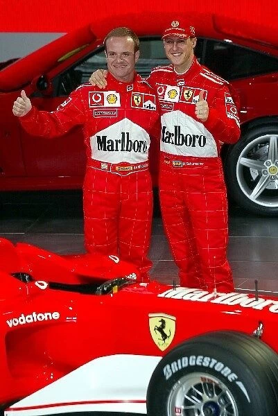 Formula One Launch: Michael Schumacher, right, and team mate Rubens Barrichello, left, with the new Ferrari F2002