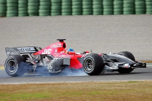Formula One Testing: Adrian Sutil MF1 Racing Test Driver locks a wheel