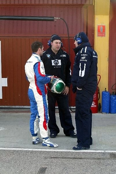 Formula One Testing: Andy Priaulx talks to Williams engineers during testing for WIlliams