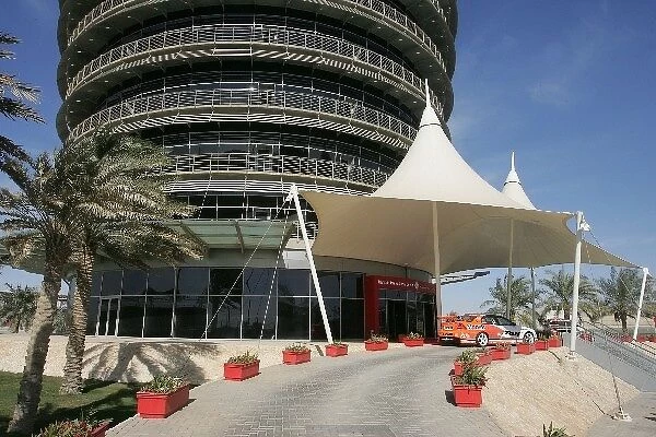 Formula One Testing: Aussie V8 Supercars on display at the entrance to the Sakhir Tower