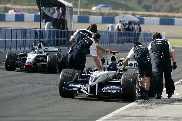 Formula One Testing: The BMW Williams FW27 V8 of Antonio Pizzonia is pushed along the pits