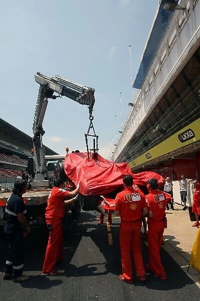 Formula One Testing: The car of Luca Badoer Ferrari F2008 is returned to the pits on a truck after a problem on track