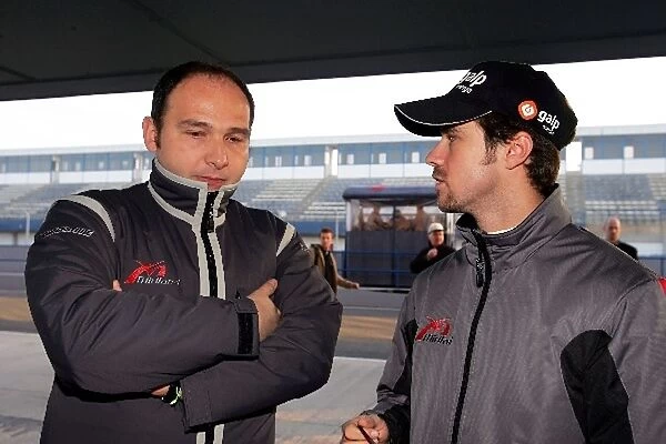 Formula One Testing: Dr Colin Kolles MF1 Racing Team Manager talks with Tiago Monteiro MF1 Racing