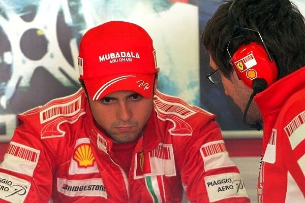 Formula One Testing: Felipe Massa Ferrari with a Ferrari engineer