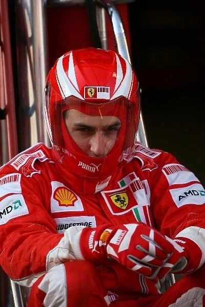 Formula One Testing: A Ferrari pit crew member