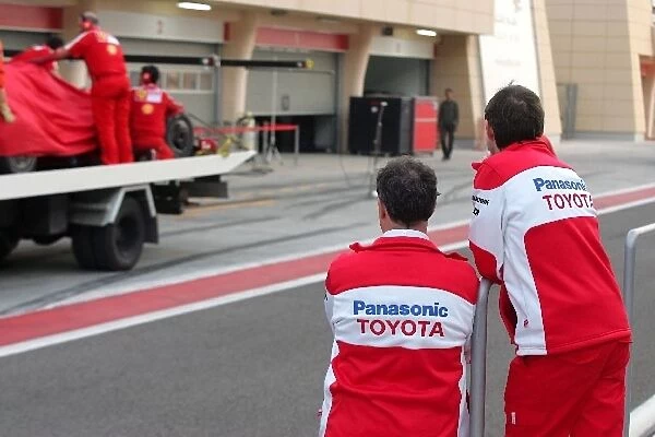 Formula One Testing: Frank Dernie Toyota and Pascal Vasselon Toyota Chassis Technical Director look on as the car of Felipe Massa Ferrari F60