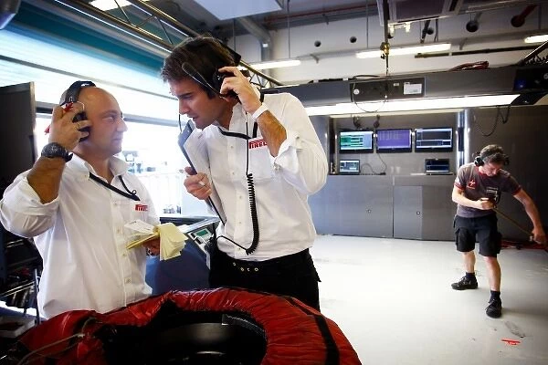Formula One Testing: Hispania F1 Racing Team Engineers and Pirelli Engineers