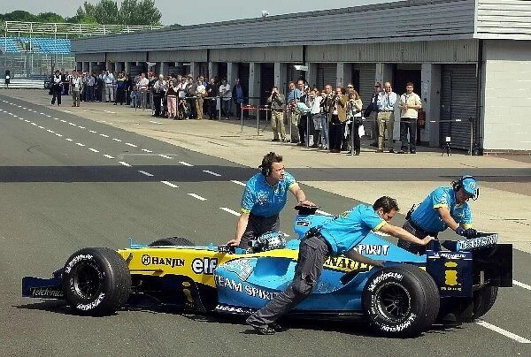 Formula One Testing: Jarno Trulli Renault R24 stops in front of the Renault guests