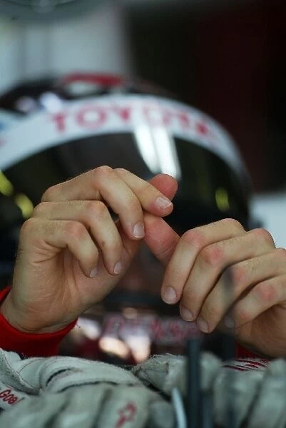 Formula One Testing: Jarno Trulli Toyota with his hands