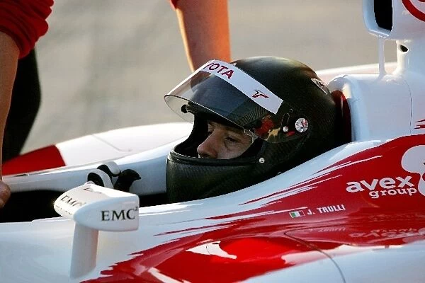 Formula One Testing: Jarno Trulli Toyota tries out a new carbon fibre helmet