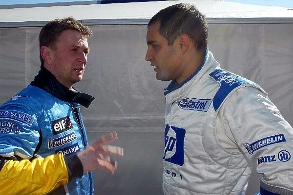 Formula One Testing: L to R: Allan McNish Renault test driver chats with Juan Pablo Montoya Williams BMW
