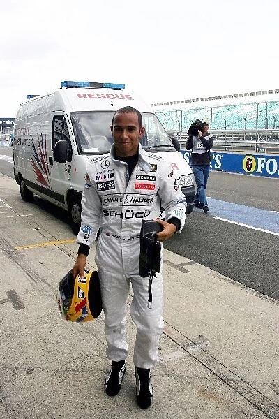 Formula One Testing: Lewis Hamilton McLaren returns to the pits after stopping out on track