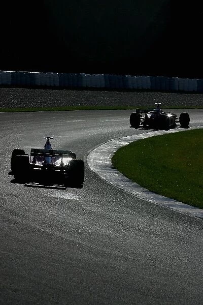 Formula One Testing: Luciano Burti Ferrari F2002 and Luca Badoer Ferrari F2002 chase each other around the Jerez circuit